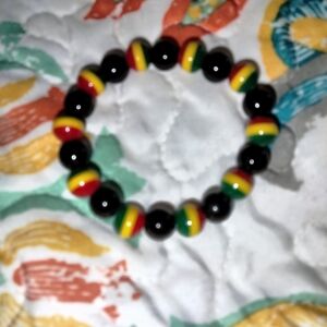 Black Beaded Bracelet with Red-Yellow-Green Accent Beads
